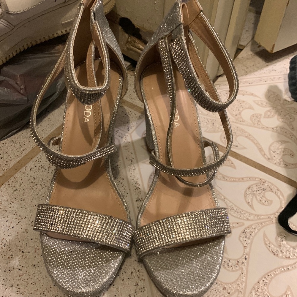 A pair of sliver bling high heels